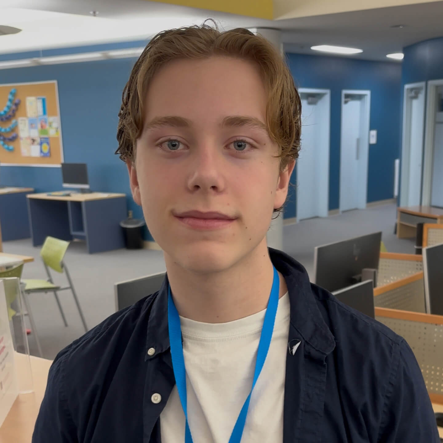 Jack wearing a youth volunteer lanyard at Tantallon Public Library